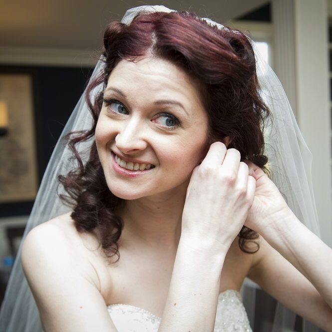 hair and makeup artist Chicago working on bride